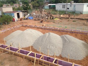 Massive mounds of gravel awaiting to be spread out